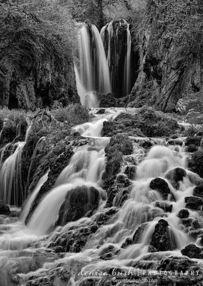 Water falls into a babbling cascade at Roughlock Falls in the Black Hillsof South Dakota.