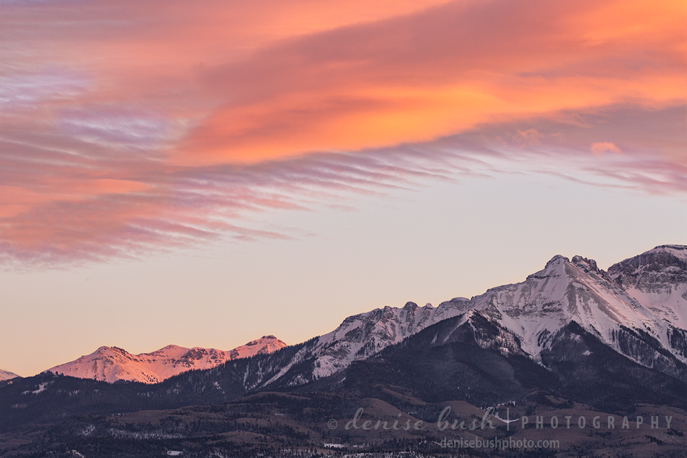High winds wispe clouds over the San Juan mountains creating what's known as horse tail clouds.