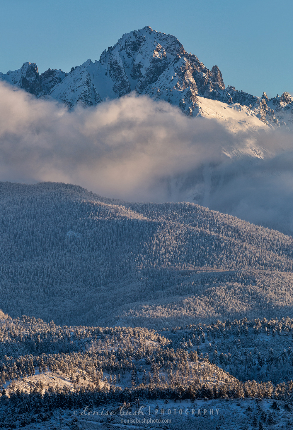 After a fresh coating of snow Mount Sneffels stands out above the clouds!